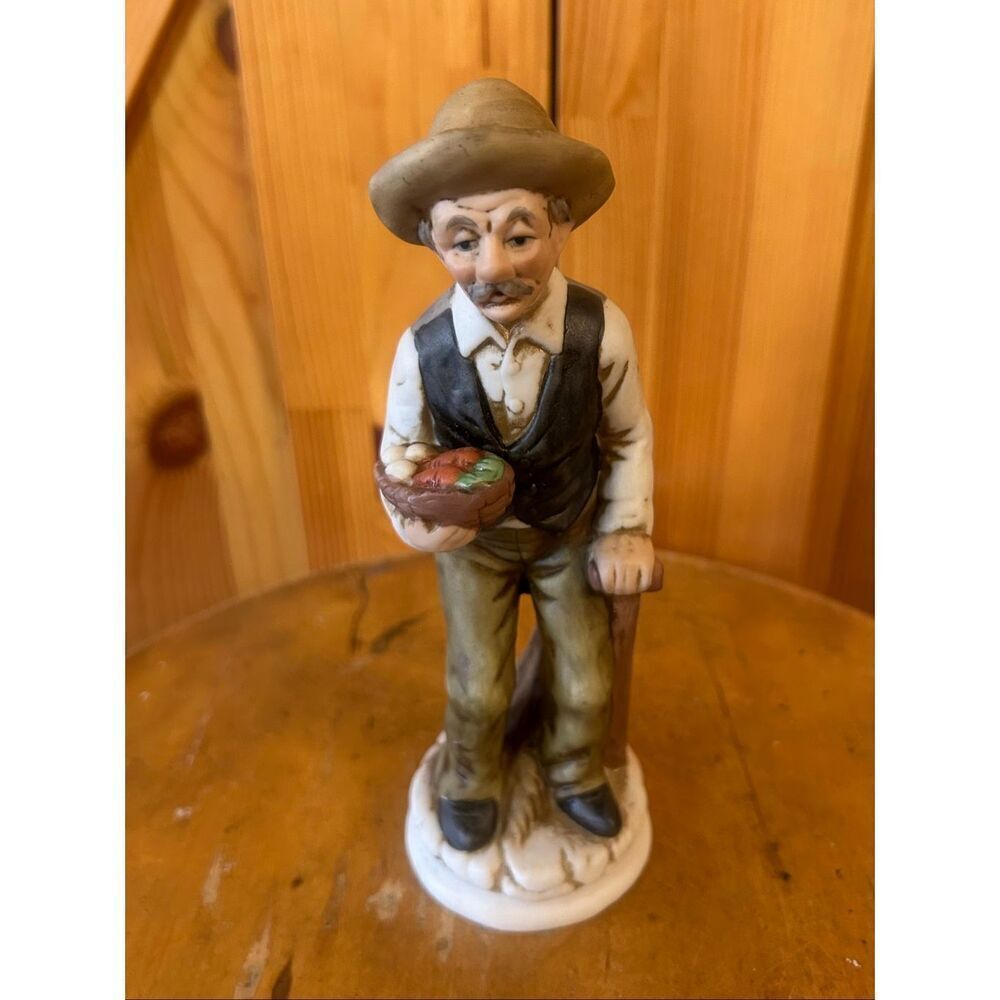 Ceramic figurine old man standing with food bowl (5556)